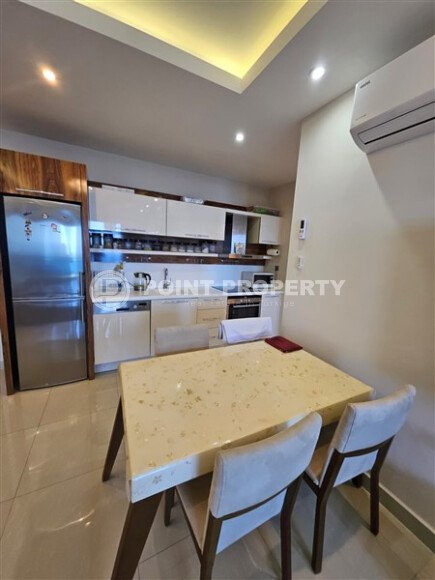 Квартира 1+1, 105 м² на первой линии в районе Махмутлар-id-9393-фото-4