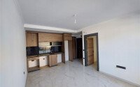 Apartment 1+1, 49 m² in the Oba area in a hotel-type complex-id-9399-photo-3