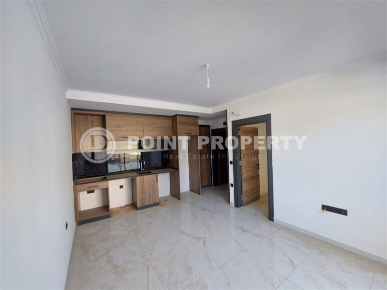 Apartment 1+1, 49 m² in the Oba area in a hotel-type complex-id-9399-photo-3