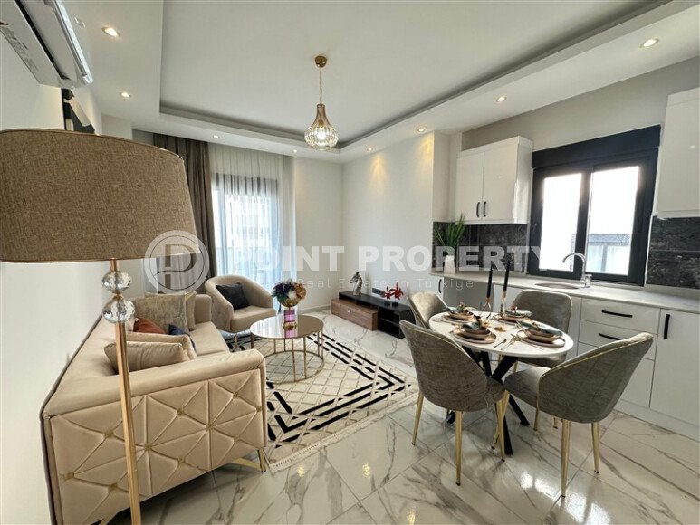 Стильная квартира 45 м² в районе Махмутлар-id-9402-фото-2