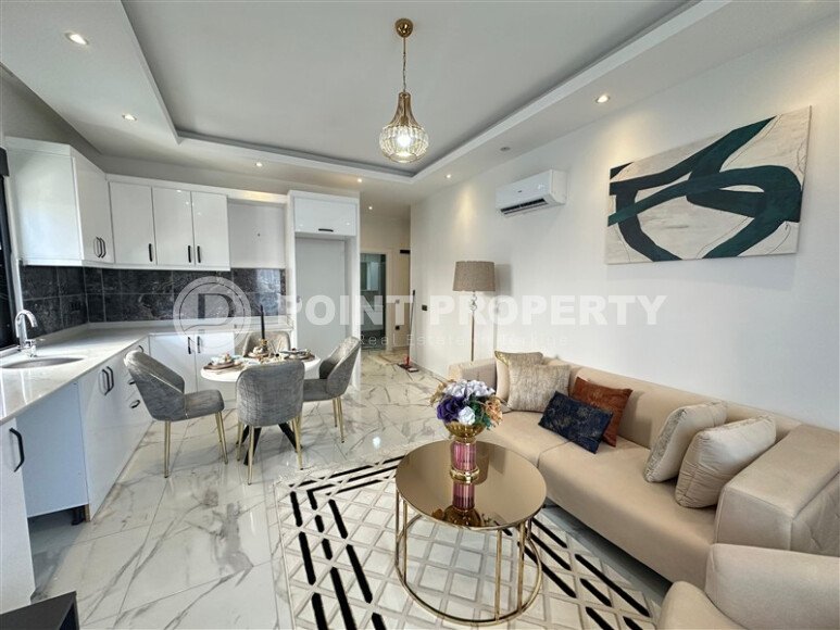 Стильная квартира 45 м² в районе Махмутлар-id-9402-фото-3