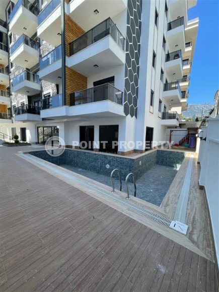 Стильная квартира 45 м² в районе Махмутлар-id-9402-фото-13