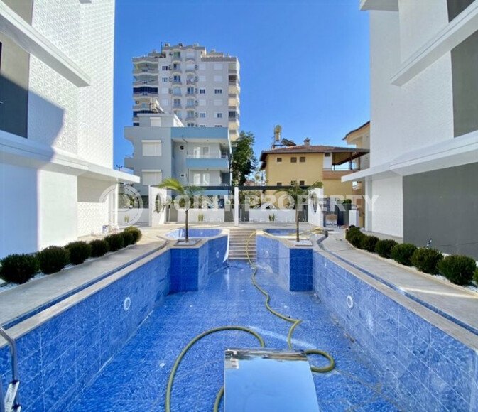 Стильная квартира 1+1, 55 м² в районе Махмутлар-id-9416-фото-6