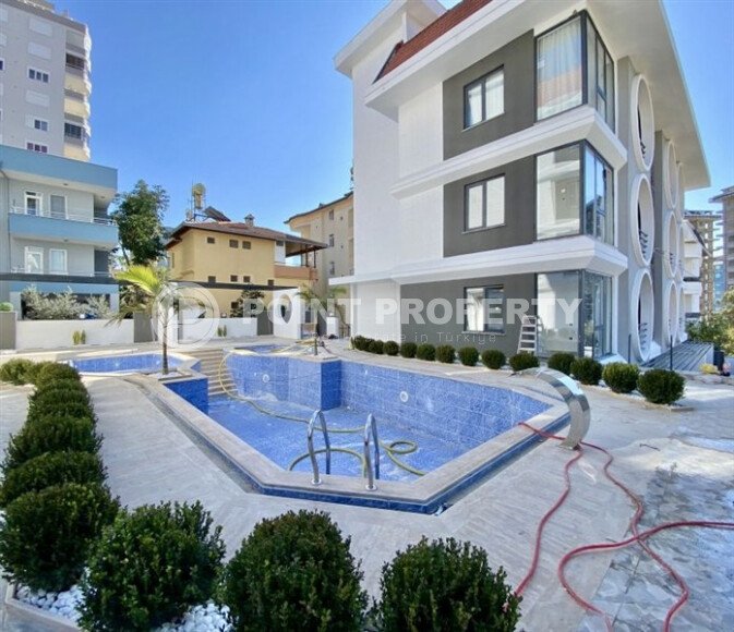 Стильная квартира 1+1, 55 м² в районе Махмутлар-id-9416-фото-8