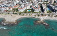Просторная квартира 105 м² в районе Тосмур, первая линия, вид на море, ВНЖ-id-9426-фото-1