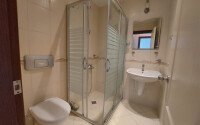 Просторная квартира 105 м² в районе Тосмур, первая линия, вид на море, ВНЖ-id-9426-фото-12