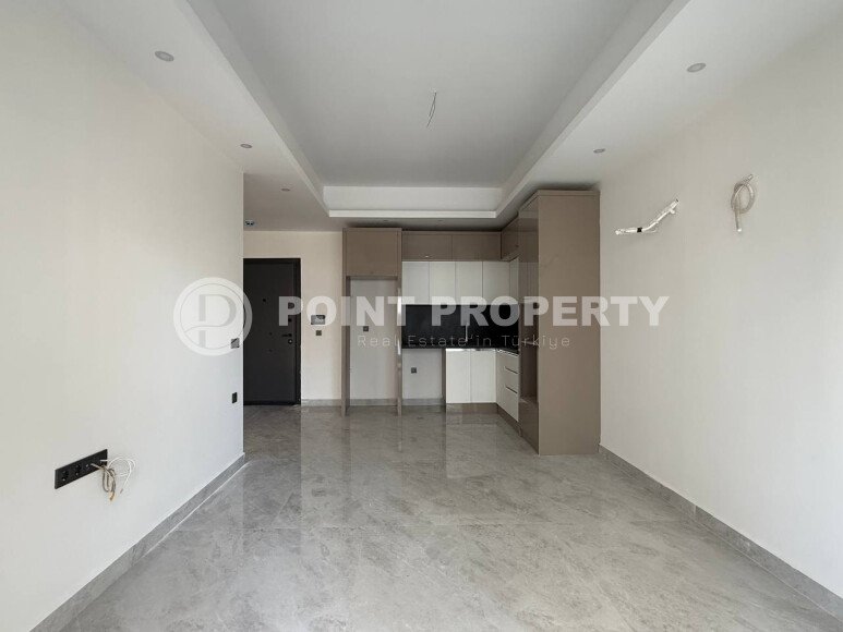 Современная квартира 55 м² в районе Махмутлар в новом комплексе, 1500 м до моря-id-9431-фото-2