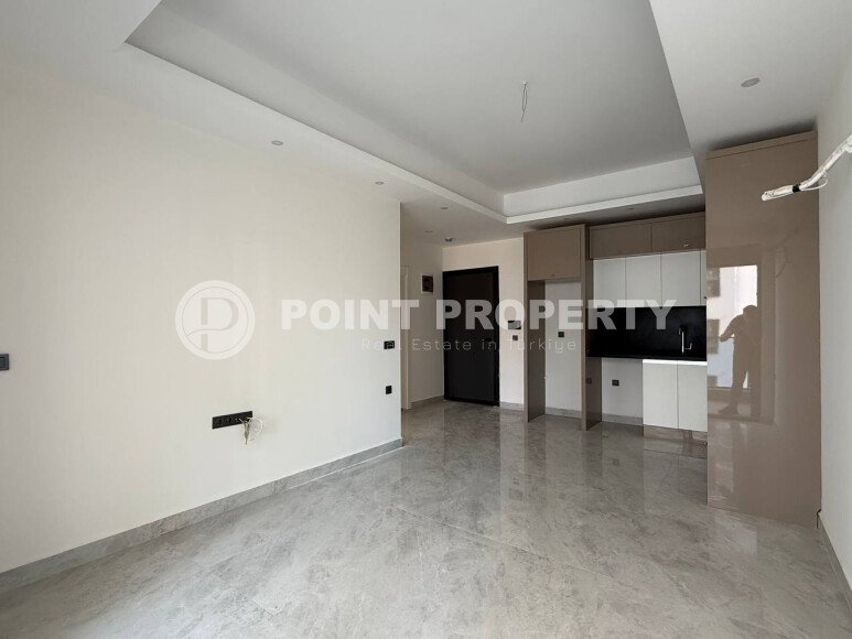 Современная квартира 55 м² в районе Махмутлар в новом комплексе, 1500 м до моря-id-9431-фото-3