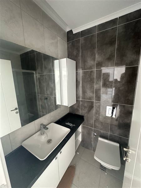 Modern 1+1 apartment, 55 m² in a 2022 complex in Mahmutlar-id-9437-photo-5