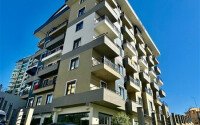 Уютная 1+1 квартира, 55 м² в новом комплексе 2023 года в районе Махмутлар-id-9438-фото-1