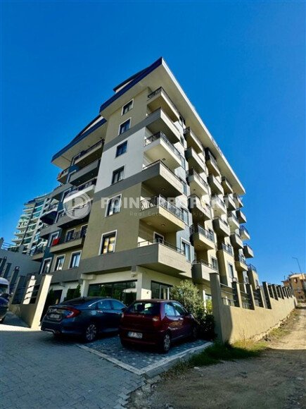 Уютная 1+1 квартира, 55 м² в новом комплексе 2023 года в районе Махмутлар-id-9438-фото-1