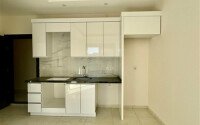 Уютная 1+1 квартира, 55 м² в новом комплексе 2023 года в районе Махмутлар-id-9438-фото-2