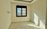 Уютная 1+1 квартира, 55 м² в новом комплексе 2023 года в районе Махмутлар-id-9438-фото-3