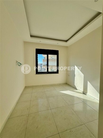 Уютная 1+1 квартира, 55 м² в новом комплексе 2023 года в районе Махмутлар-id-9438-фото-3