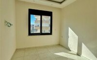Уютная 1+1 квартира, 55 м² в новом комплексе 2023 года в районе Махмутлар-id-9438-фото-4