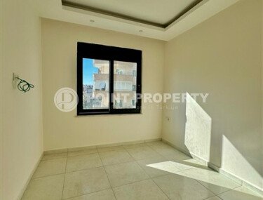 Уютная 1+1 квартира, 55 м² в новом комплексе 2023 года в районе Махмутлар-id-9438-фото-4