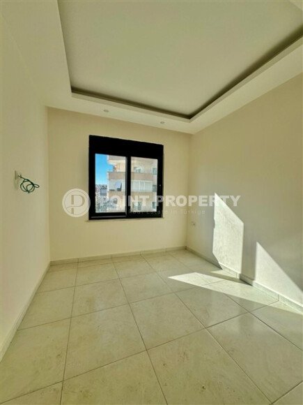 Уютная 1+1 квартира, 55 м² в новом комплексе 2023 года в районе Махмутлар-id-9438-фото-4