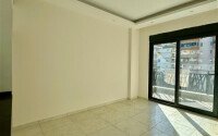 Уютная 1+1 квартира, 55 м² в новом комплексе 2023 года в районе Махмутлар-id-9438-фото-5