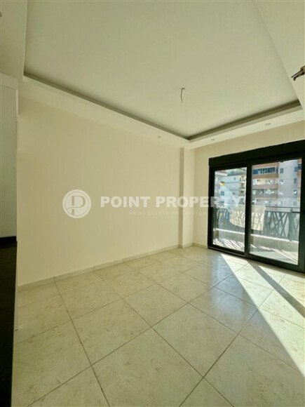 Уютная 1+1 квартира, 55 м² в новом комплексе 2023 года в районе Махмутлар-id-9438-фото-5