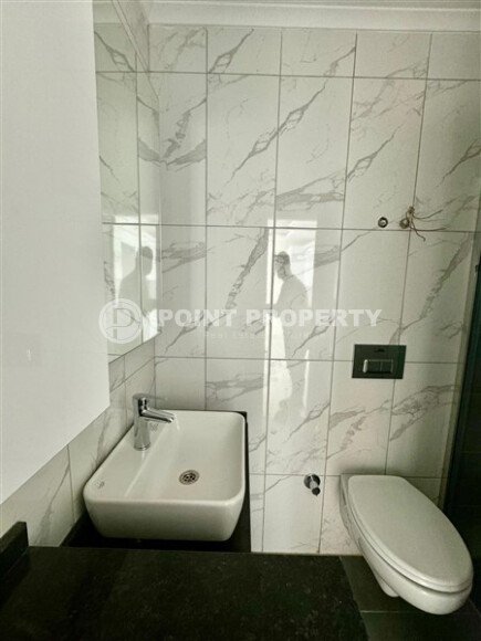 Уютная 1+1 квартира, 55 м² в новом комплексе 2023 года в районе Махмутлар-id-9438-фото-7