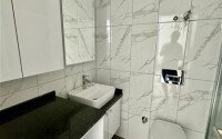 Уютная 1+1 квартира, 55 м² в новом комплексе 2023 года в районе Махмутлар-id-9438-фото-8