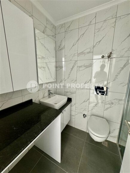 Уютная 1+1 квартира, 55 м² в новом комплексе 2023 года в районе Махмутлар-id-9438-фото-8