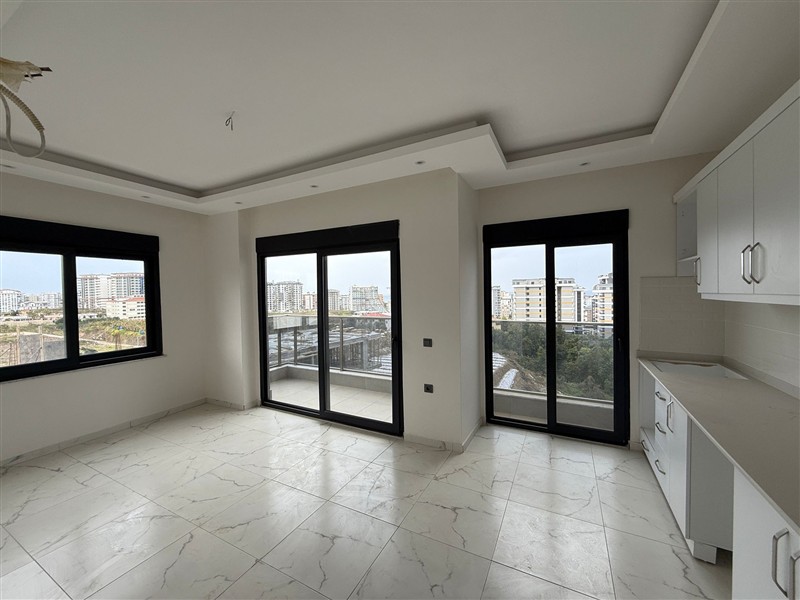 Современная 1+1 квартира, 50 м² в новом комплексе 2024 года в Махмутларе-id-9442-фото-2