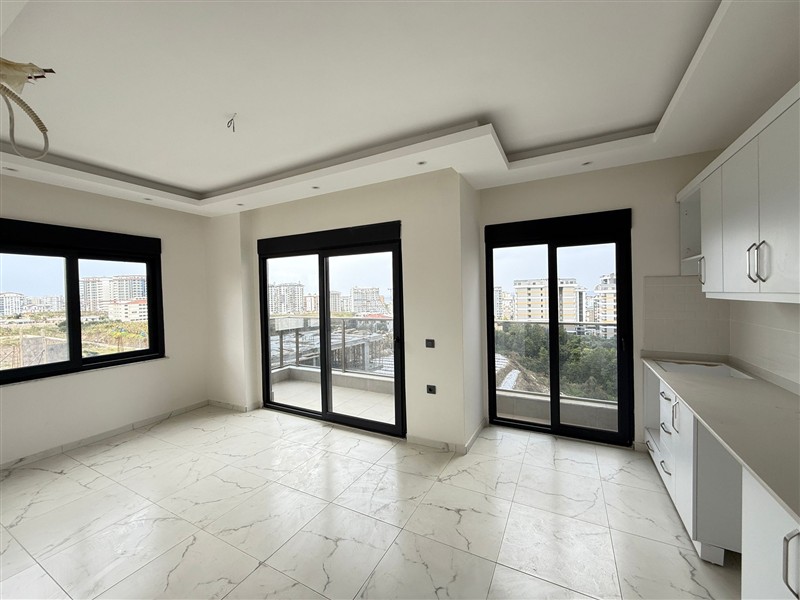 Современная 1+1 квартира, 50 м² в новом комплексе 2024 года в Махмутларе-id-9442-фото-3