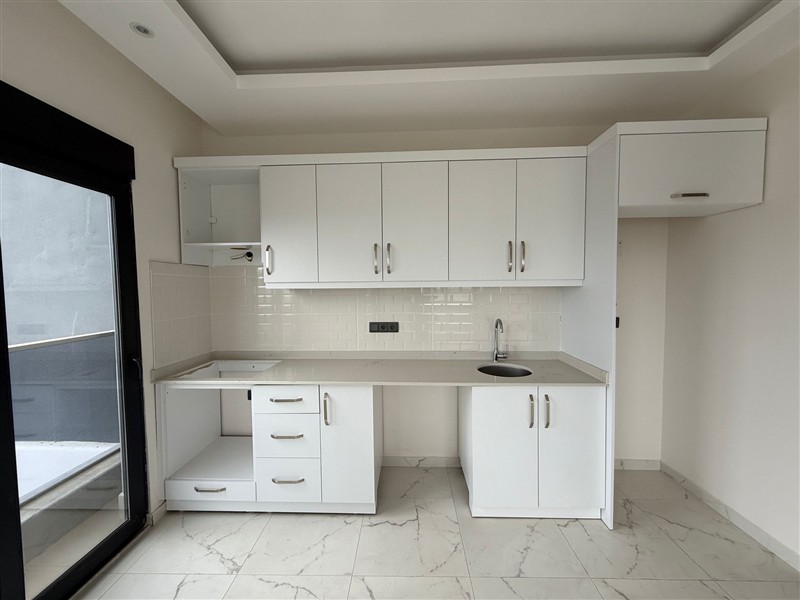 Современная 1+1 квартира, 50 м² в новом комплексе 2024 года в Махмутларе-id-9442-фото-4