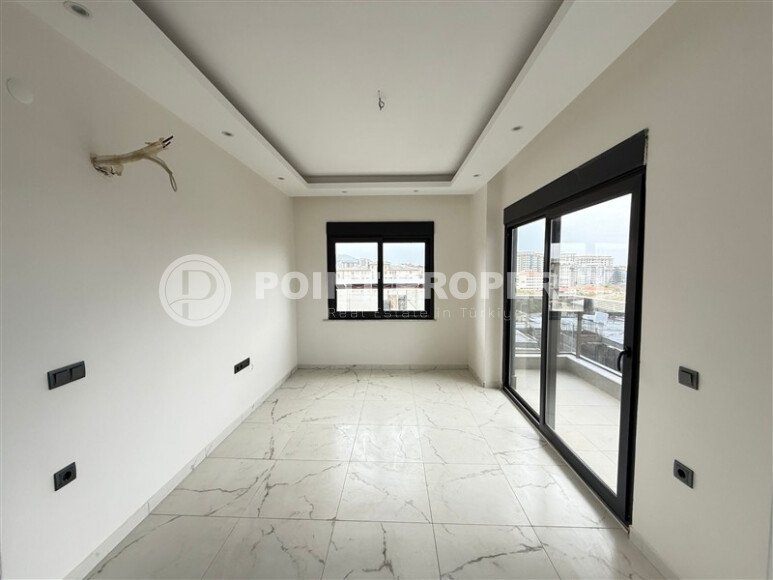 Современная 1+1 квартира, 50 м² в новом комплексе 2024 года в Махмутларе-id-9442-фото-7