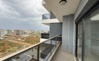 Современная 1+1 квартира, 50 м² в новом комплексе 2024 года в Махмутларе-id-9442-фото-12