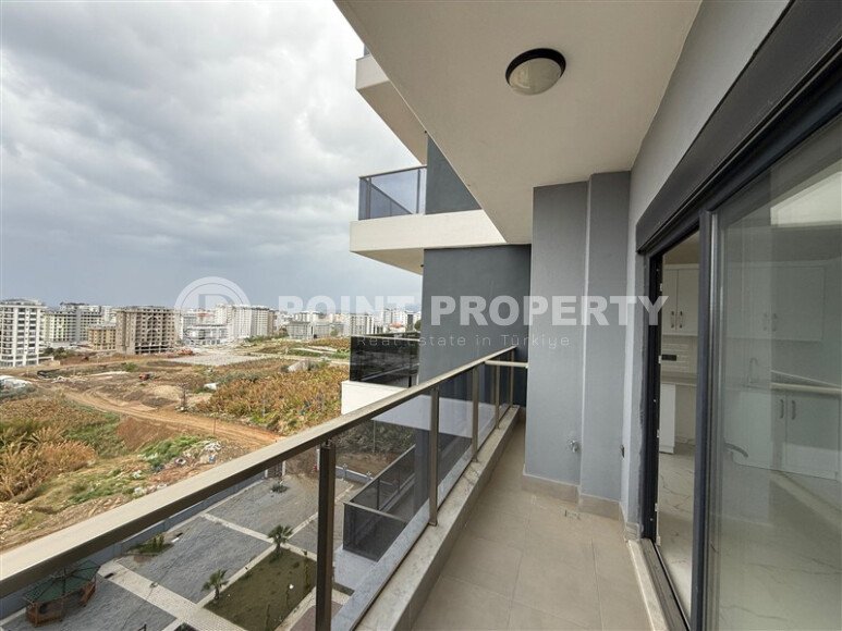 Современная 1+1 квартира, 50 м² в новом комплексе 2024 года в Махмутларе-id-9442-фото-12