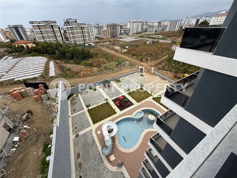 Современная 1+1 квартира, 50 м² в новом комплексе 2024 года в Махмутларе-id-9442-фото-13