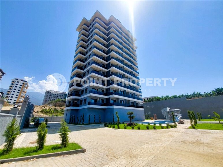 Современная 1+1 квартира, 50 м² в новом комплексе 2024 года в Махмутларе-id-9442-фото-14