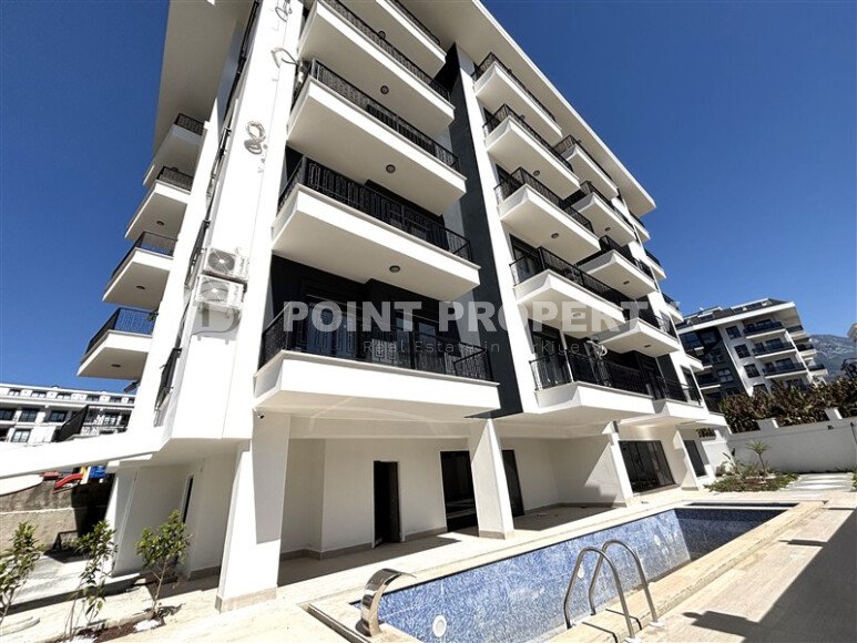 Светлая квартира 45 м² в Махмутларе, в новом комплексе-id-9451-фото-1