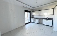 Светлая квартира 45 м² в Махмутларе, в новом комплексе-id-9451-фото-3