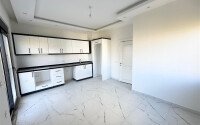 Светлая квартира 45 м² в Махмутларе, в новом комплексе-id-9451-фото-4