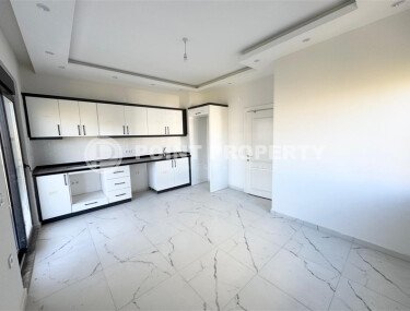 Светлая квартира 45 м² в Махмутларе, в новом комплексе-id-9451-фото-4