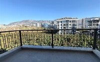 Светлая квартира 45 м² в Махмутларе, в новом комплексе-id-9451-фото-9