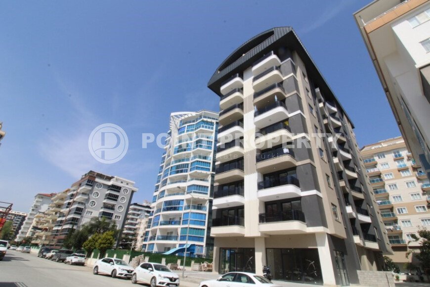 Новая светлая квартира 1+1 в новом комплексе в районе Махмутлар-id-9459-фото-2