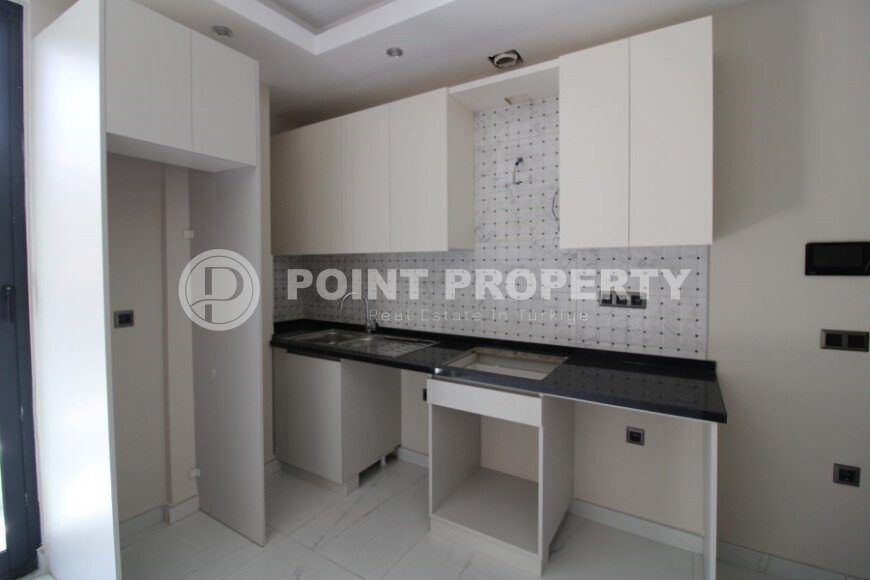 Новая светлая квартира 1+1 в новом комплексе в районе Махмутлар-id-9459-фото-4