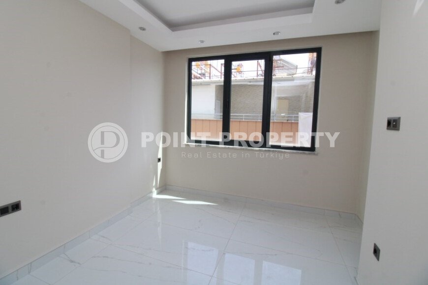 Новая светлая квартира 1+1 в новом комплексе в районе Махмутлар-id-9459-фото-6