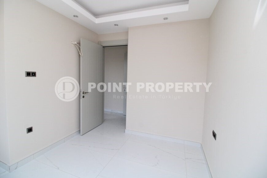 Новая светлая квартира 1+1 в новом комплексе в районе Махмутлар-id-9459-фото-7