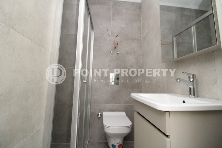 Новая светлая квартира 1+1 в новом комплексе в районе Махмутлар-id-9459-фото-9