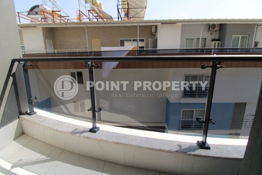 Новая светлая квартира 1+1 в новом комплексе в районе Махмутлар-id-9459-фото-11