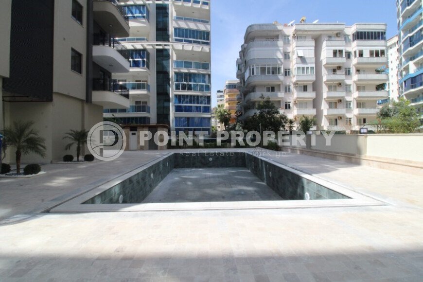 Новая светлая квартира 1+1 в новом комплексе в районе Махмутлар-id-9459-фото-12