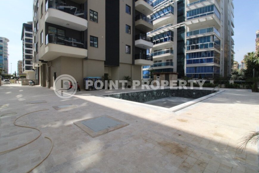 Новая светлая квартира 1+1 в новом комплексе в районе Махмутлар-id-9459-фото-13