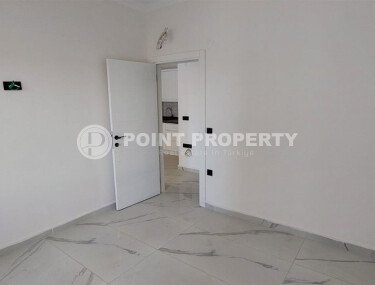 Новая квартира 55 м² в современном комплексе Махмутлара-id-9471-фото-4