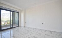 Двухуровневая квартира 3+1 площадью 120 м² в Алании в комплексе 2024 года-id-9481-фото-14