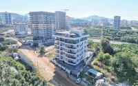 Двухуровневая квартира 3+1 площадью 120 м² в Алании в комплексе 2024 года-id-9481-фото-36